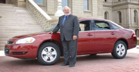 Click to enlarge: Senator Kahn and his ethanol-powered car