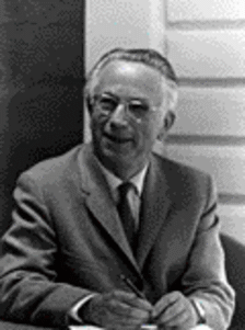 Alden B. Dow at desk