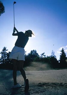 sunset golfer
