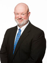 [Photo of Paul J. Larkin Jr.]