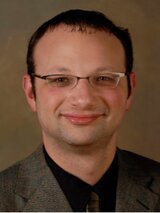 [Photo of Marc A. Levin]