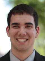 [Photo of Zachary Dawes]