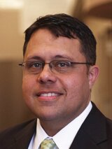 [Photo of Manny Lopez]