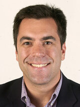 [Photo of Greg Harris]