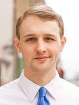 [Photo of Evan Carter]