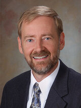 [Photo of Michael R. Winther]