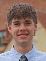 [Photo of Charlie Van Beek]
