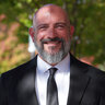 [Photo of Steve Caruso]