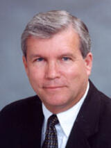 [Photo of Dr. Dave C. Aussicker]