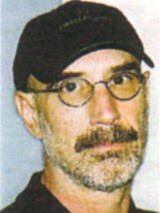 [Photo of Michael Benda]