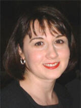 [Photo of Leslie Carbone]