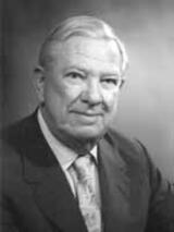 [Photo of Peter C. Cook]