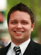 [Photo of Christopher A. Deming]