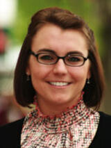 [Photo of Claire S. Forman]