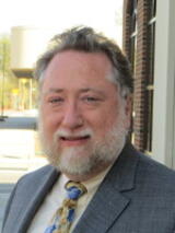 [Photo of Stephen J. Frick]