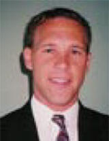 [Photo of Robert Genetski]