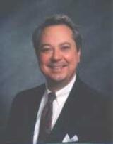 [Photo of James E. Kostrava]