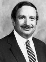 [Photo of Dr. Brian G. Long]