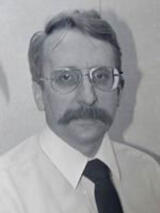 [Photo of Dr. John Semmens]