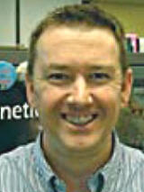 [Photo of Todd K. Slisher]