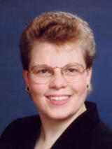 [Photo of Christina K. Smith]